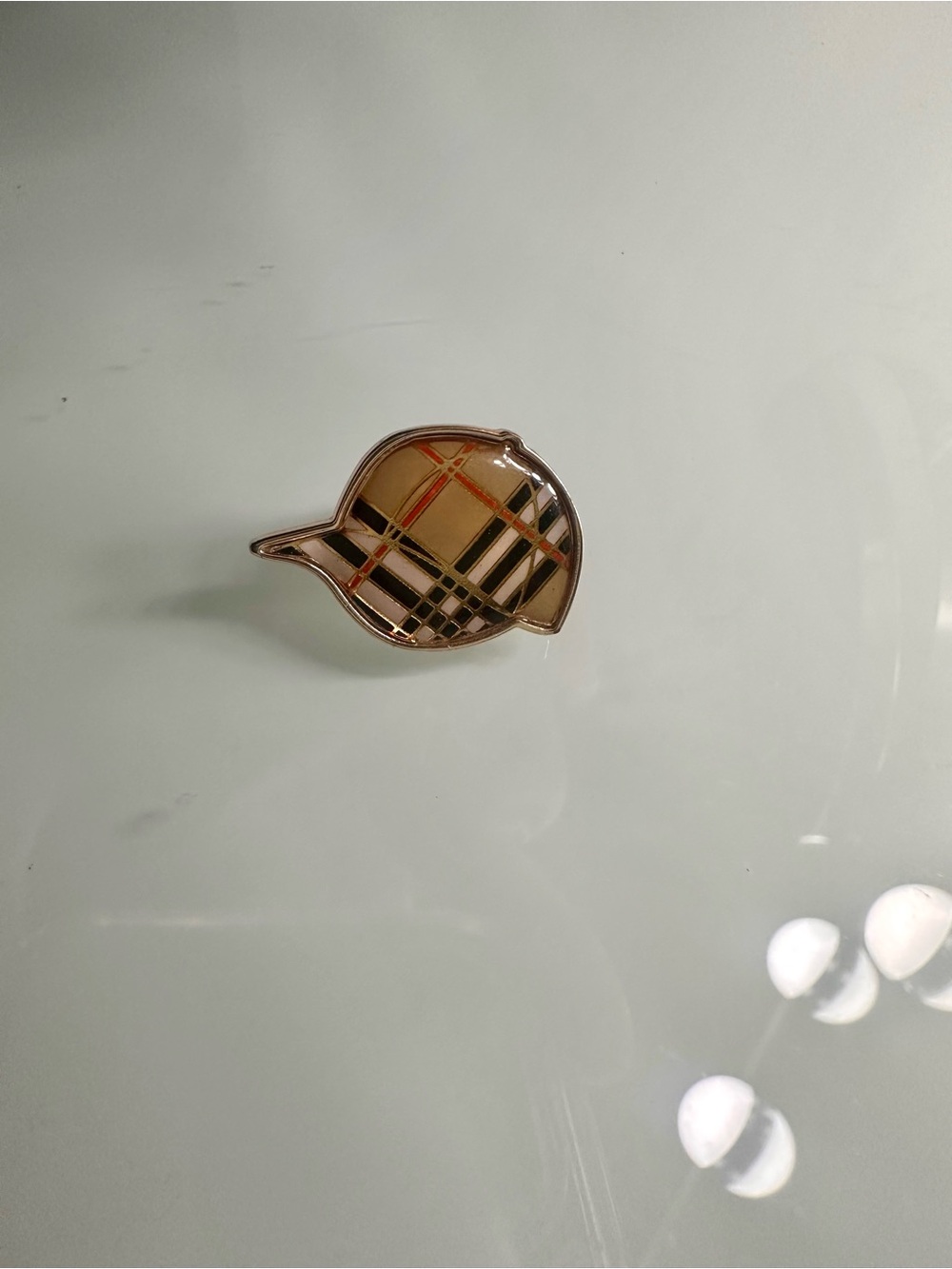 Burberry Beige Plaid Cuff Link with Black and Red Accents